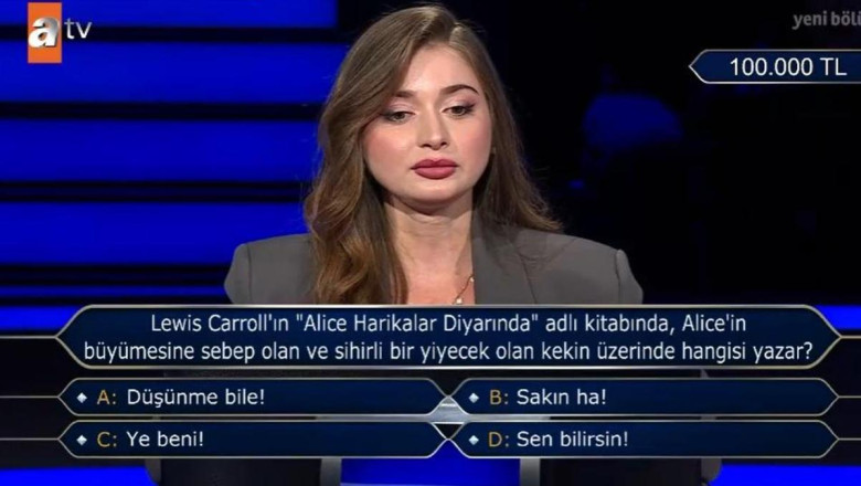 Alice Harikalar Diyarı kitabı! Alice'in büyümesine sebep olan ve sihirli bir yiyecek olan kekin üzerinde hangisi yazar?